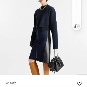 Black Louis Vuitton Bella bag.